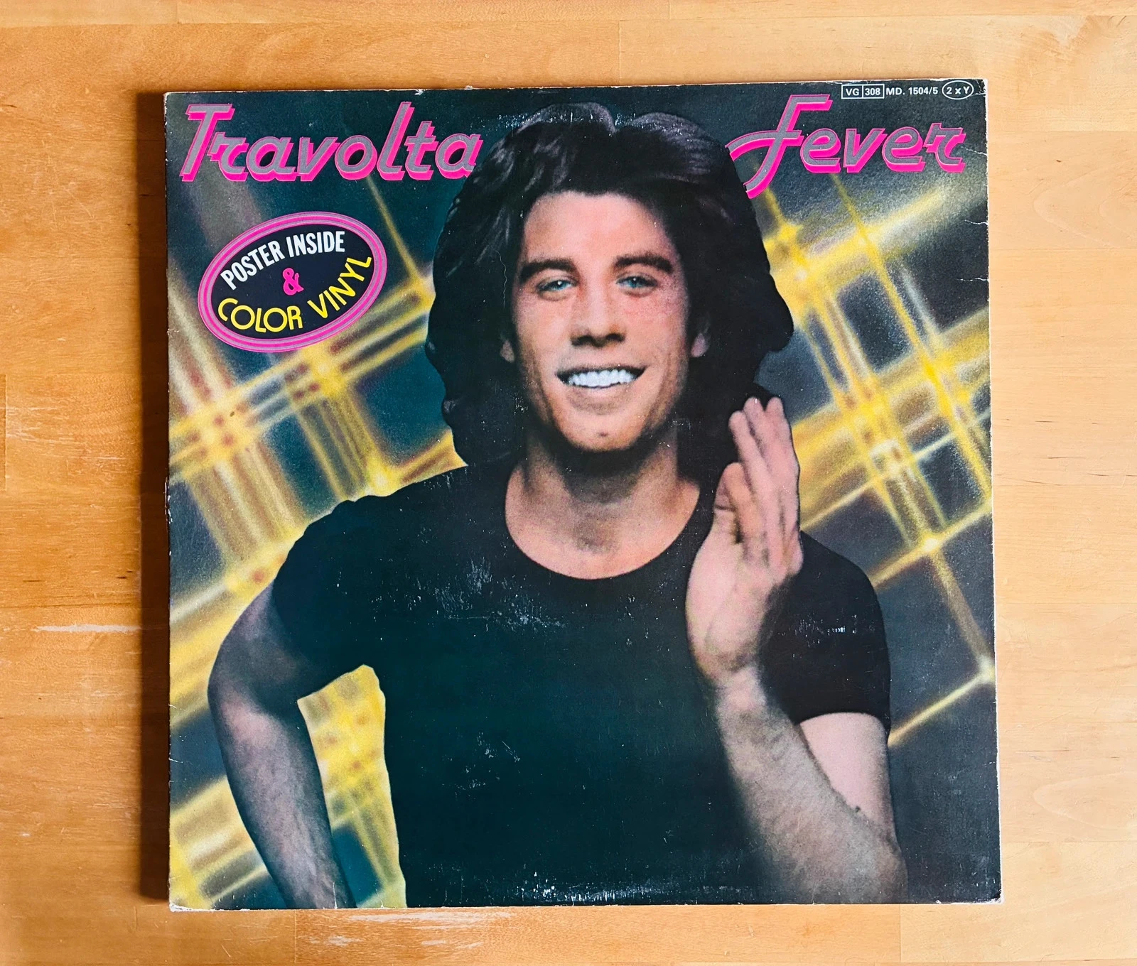 Disque vinyle double 33T John Travolta Fever édition collector colorée.